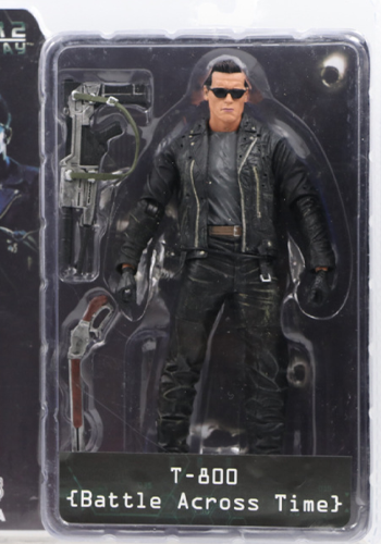 T-800 figure with sunglasses and accessories displayed in a clear blister tray