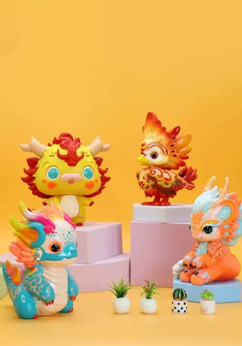 Four colorful dragon collectible figures arranged on display blocks