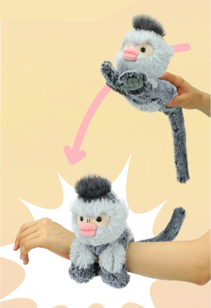 Yunnan golden monkey plush with slap-band tail in its wrapped position